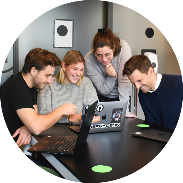 Summit Learning Solutions team working on project.
